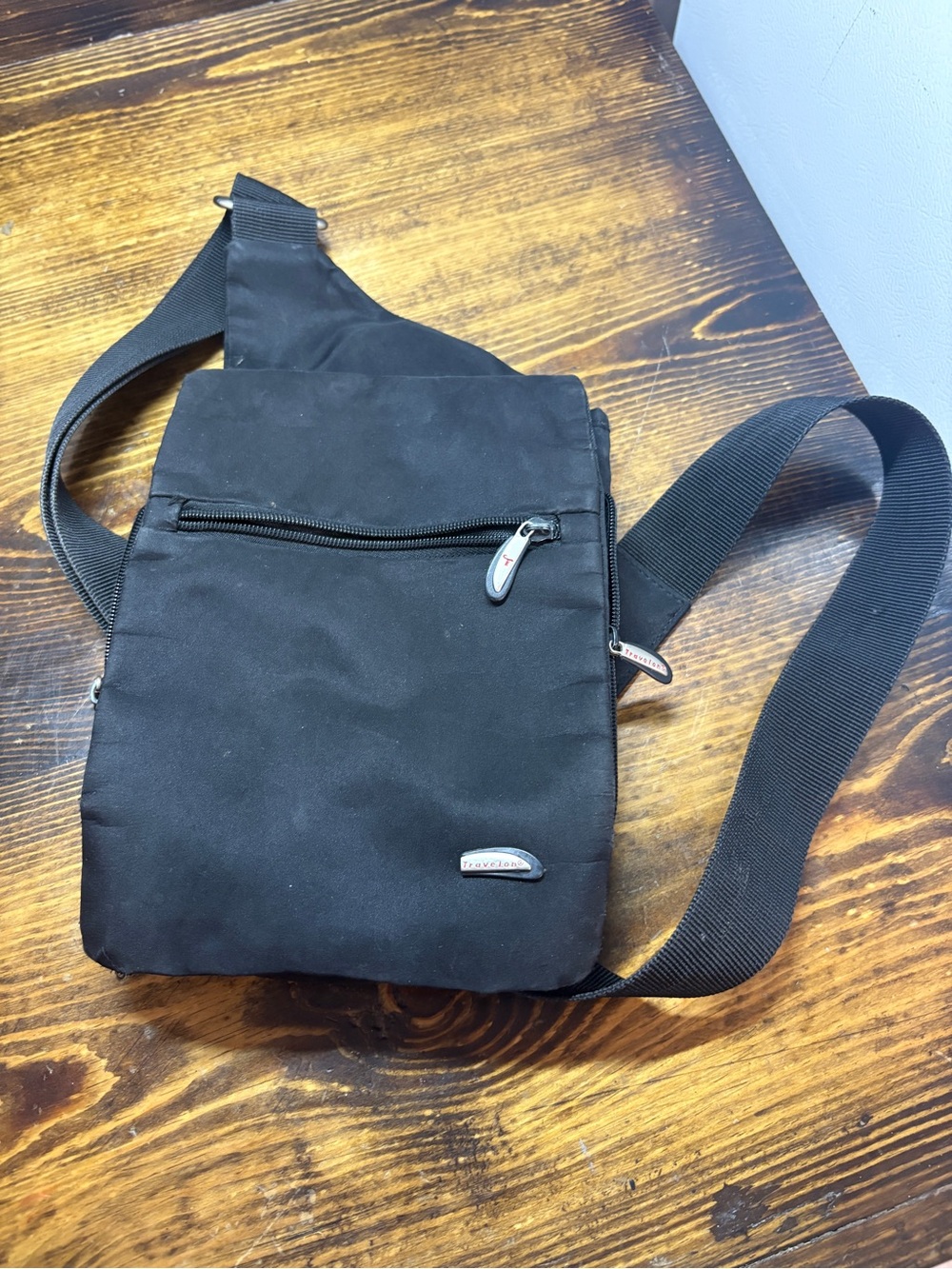 Travelon black sling  bag